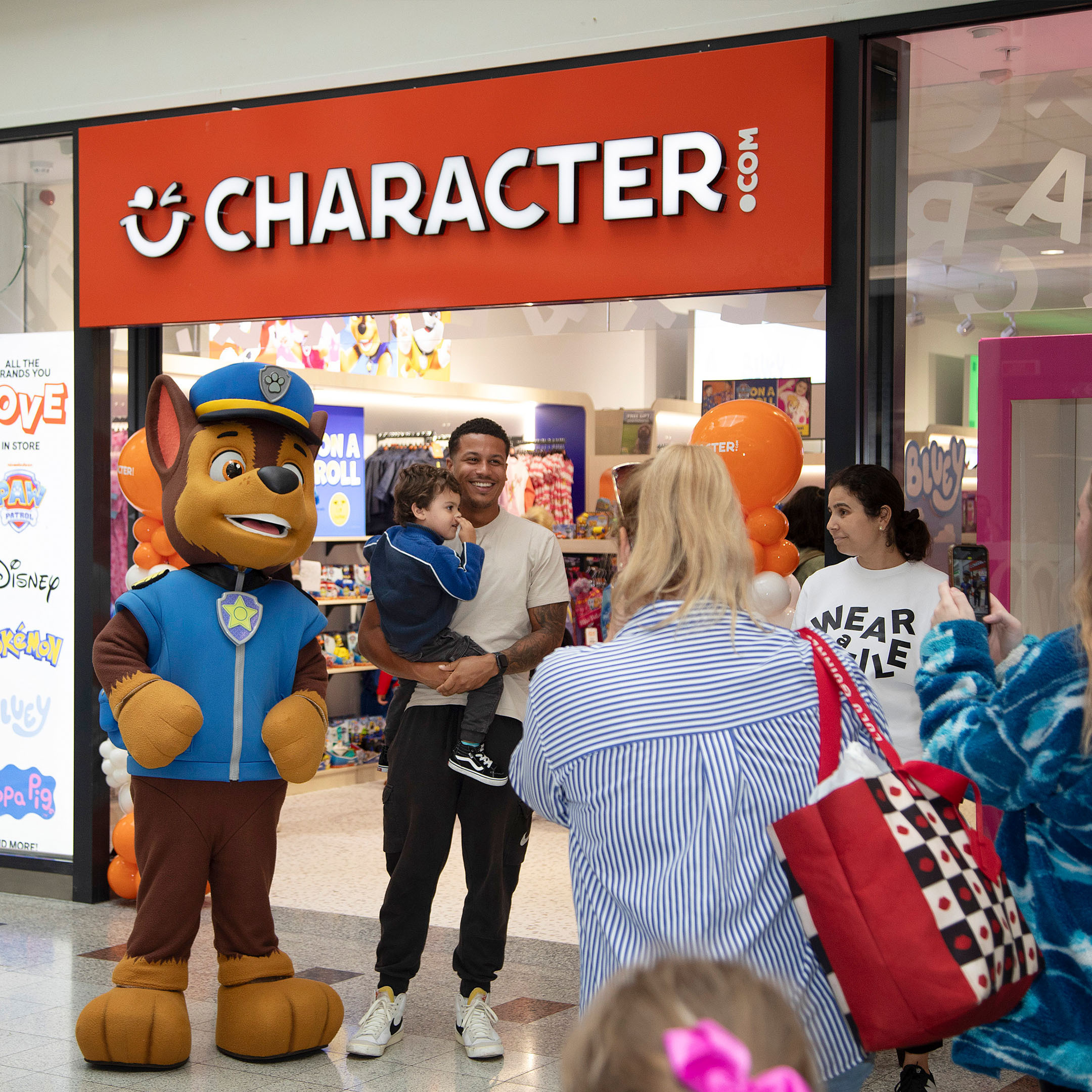 paw patrol mascot stood out the front of character store
