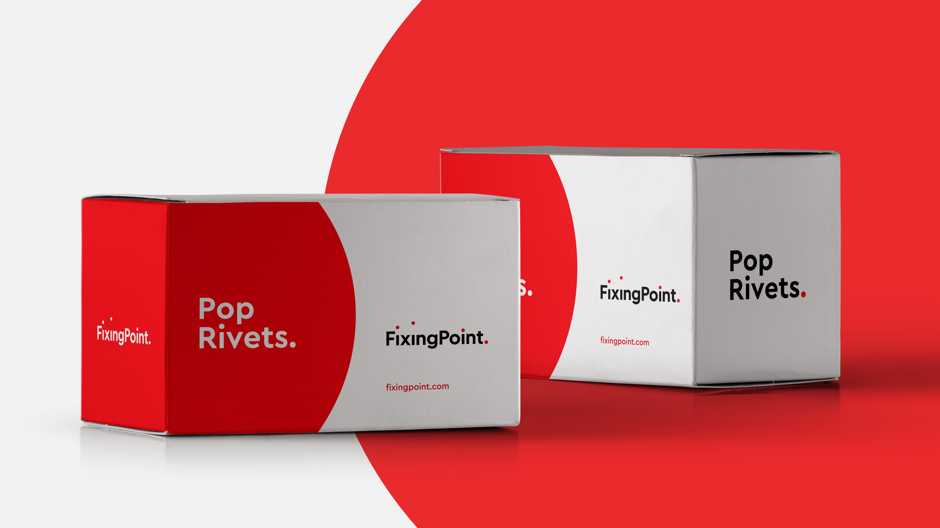 Packaging boxes with Fixing Point branding on