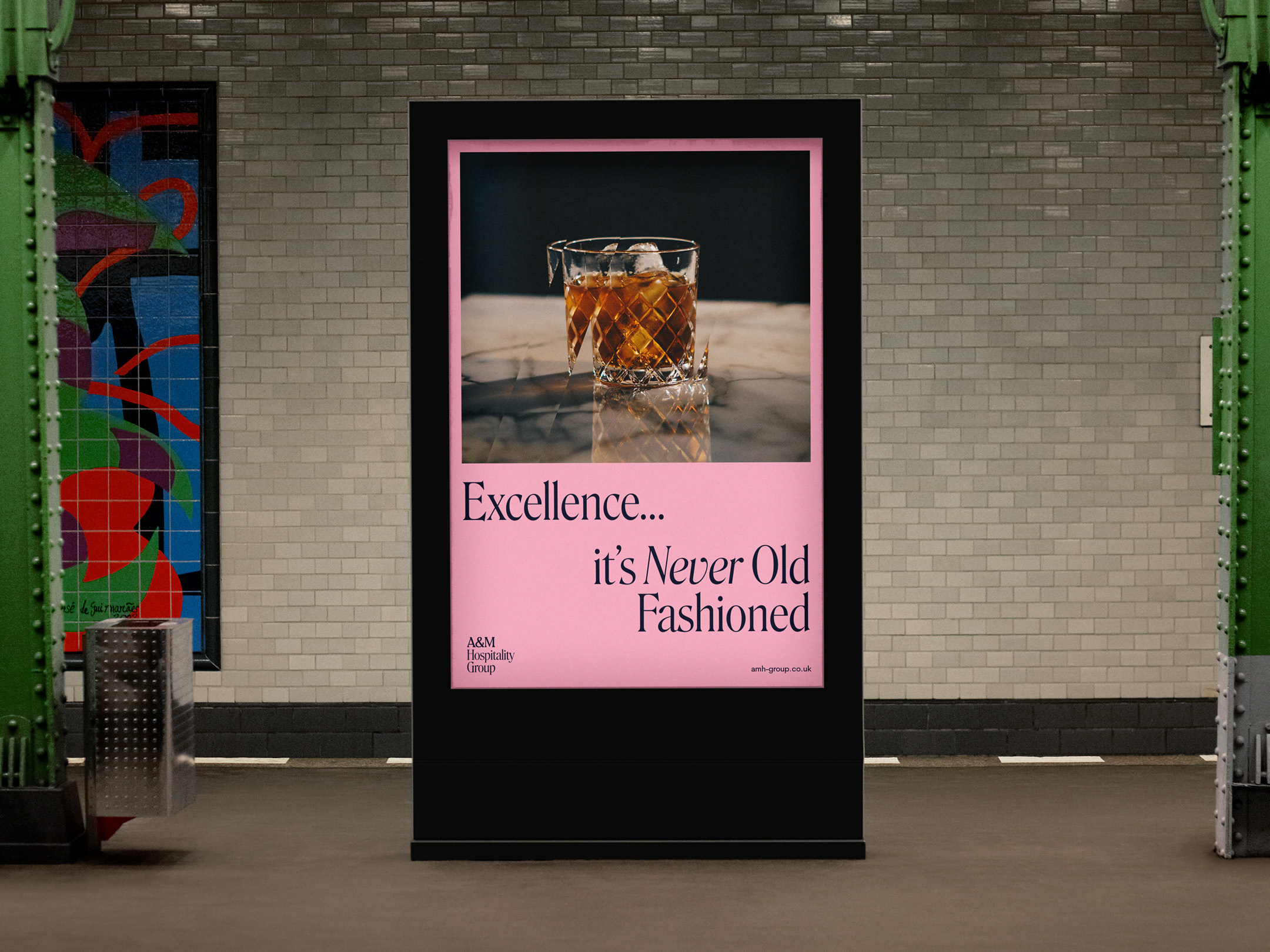 Poster advertising A&M on a subway station platform