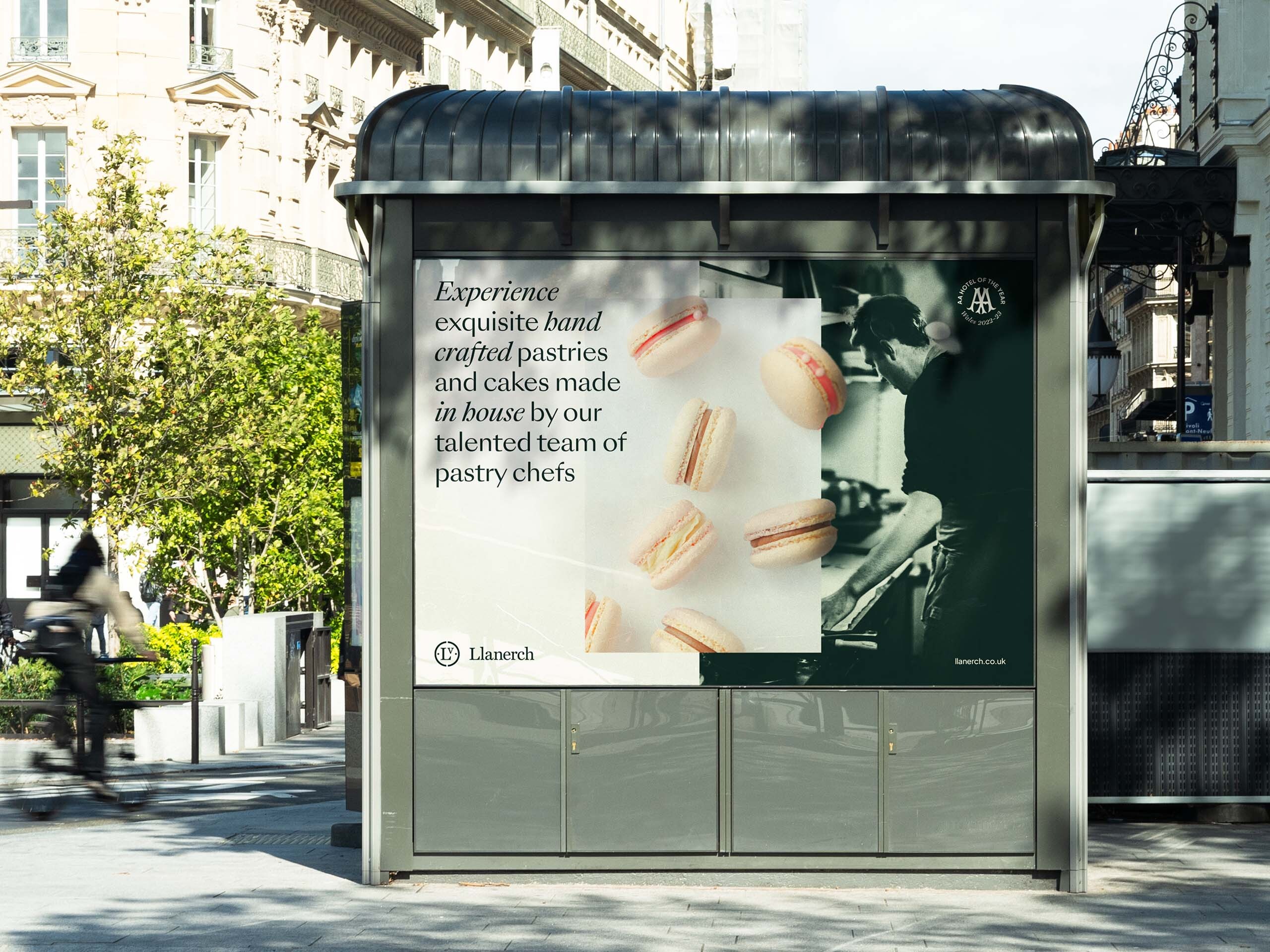 An advert on a billboard promoting Llanerch's in house pastry chefs