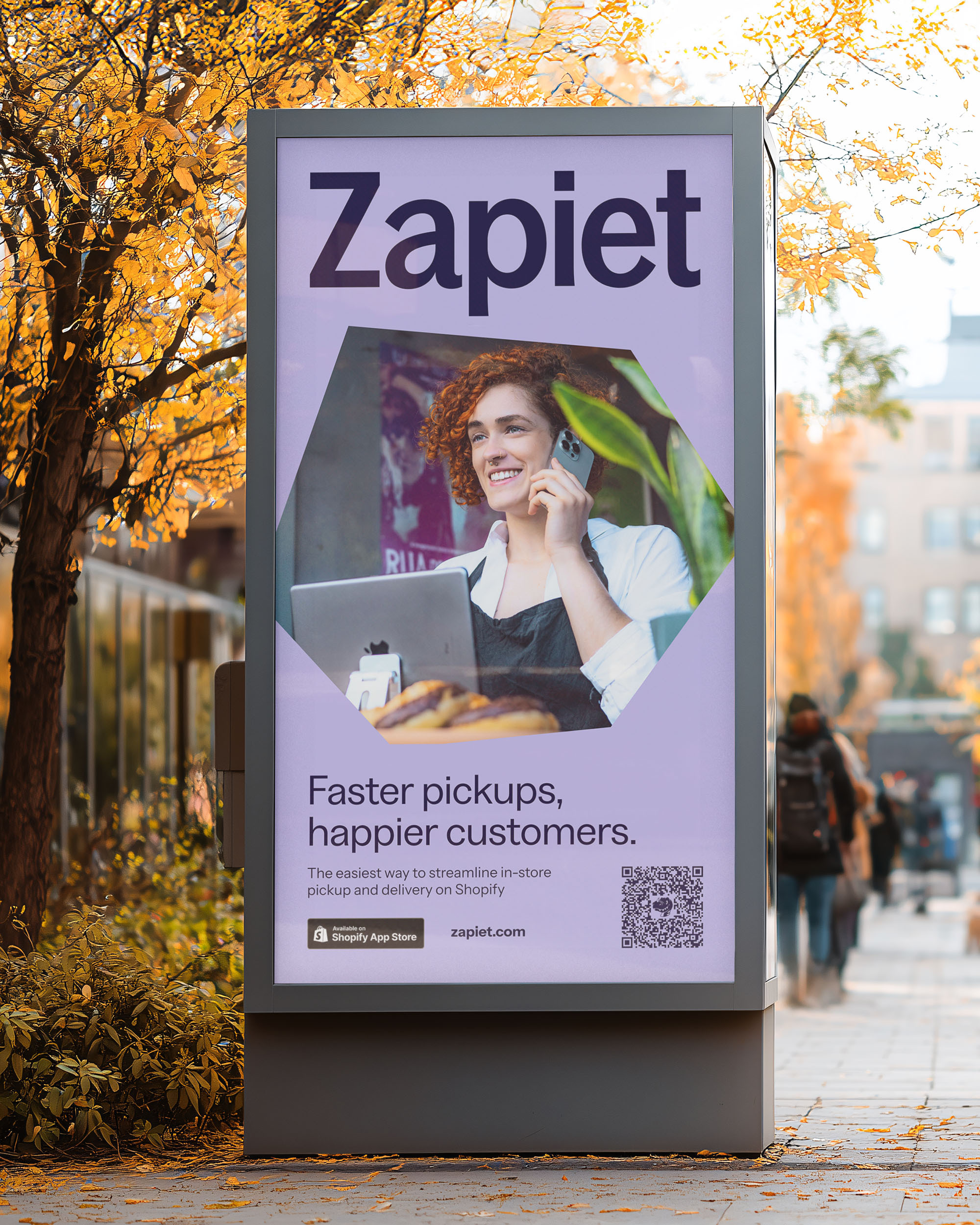 Digital billboard on a hight street in autumn