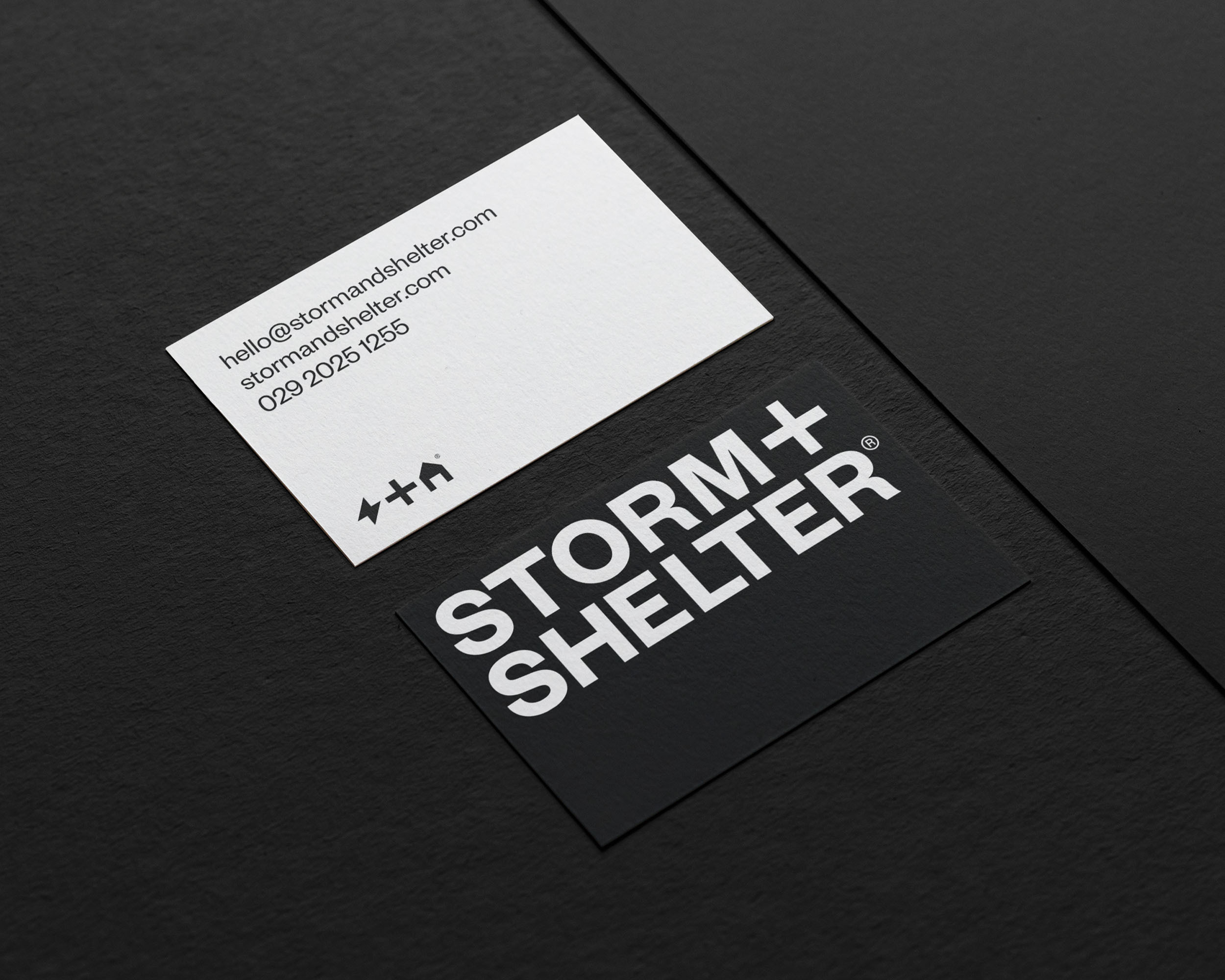 a storm and shelter branded business card